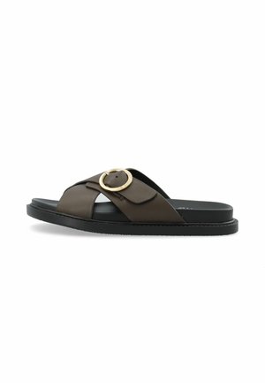 Brown leather slide sandal with cross straps, round gold accent, and black rubber sole. Flat design with minimal texture.