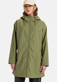 Olive green rain jacket with a zip closure, adjustable hood, and long sleeves. Smooth, waterproof fabric with minimal seams.