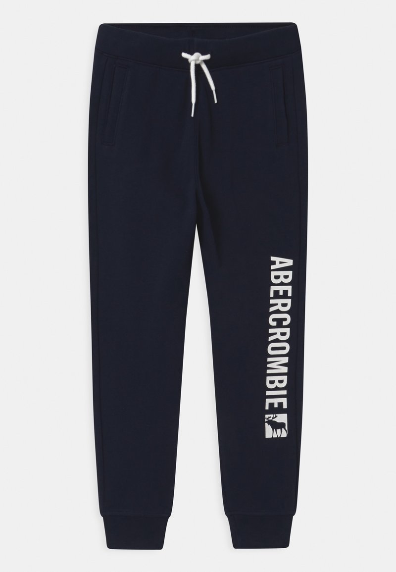 Navy sweatpants made of soft fabric with elastic waistband, white drawstring, side pockets, and "ABERCROMBIE" text along the left leg.