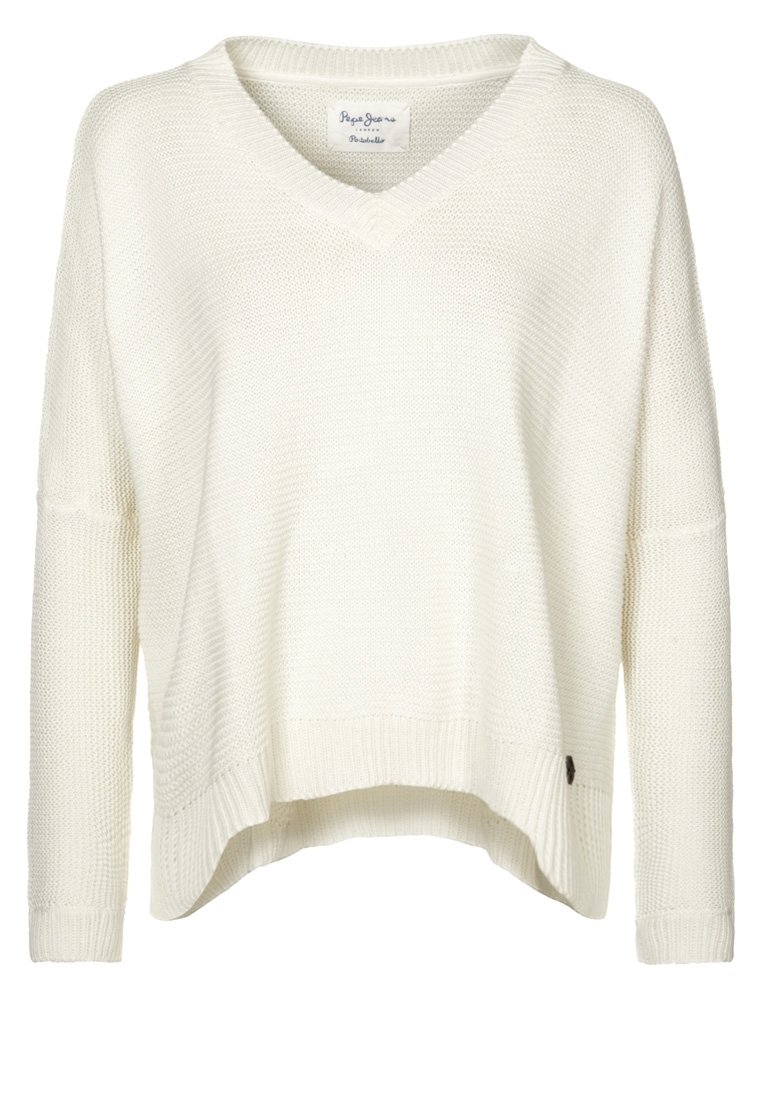 Kremowy sweter z dzianiny z dekoltem w serek, luźnym fasonem, opadającymi ramionami i ściągaczem u dołu. Posiada małą metkę marki po bokach.