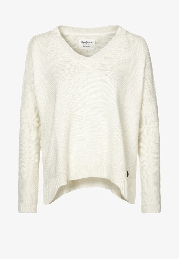 Kremowy sweter z dzianiny z dekoltem w serek, luźnym fasonem, opadającymi ramionami i ściągaczem u dołu. Posiada małą metkę marki po bokach.