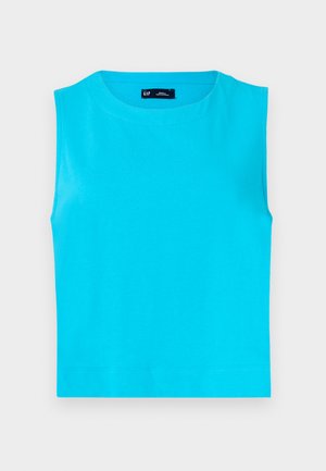 Majica bez rukava, svijetloplave boje napravljena od mekog pamuka. Ima okrugli izrez i ravni, skraćeni rub bez vidljivih kopčanja.