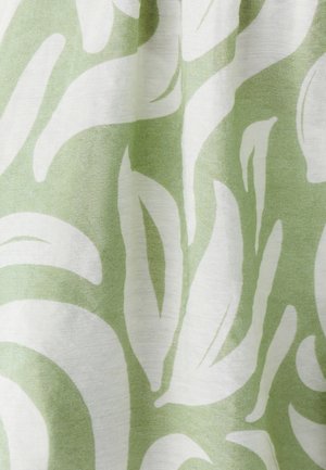 Green and white fabric featuring abstract leaf patterns. Material appears lightweight with a slightly textured surface.