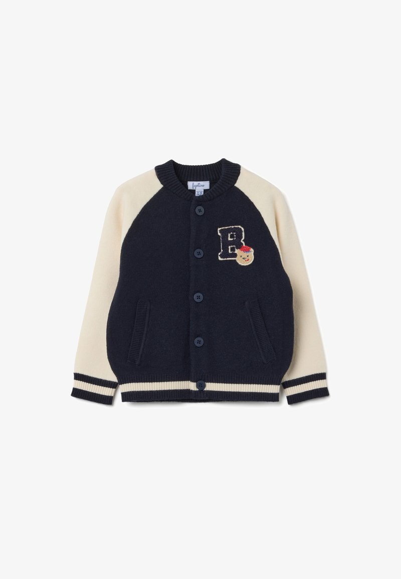 Cardigan per bambini in blu navy e crema con maniche raglan, chiusura a bottoni e tasche frontali. Presenta un ricamo con la lettera "B" e un design di personaggio.
