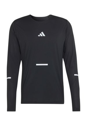 Czarna sportowa koszulka z długim rękawem i okrągłym dekoltem, logo Adidas na piersi oraz małe białe odblaskowe paski na rękawach i na środku z przodu.