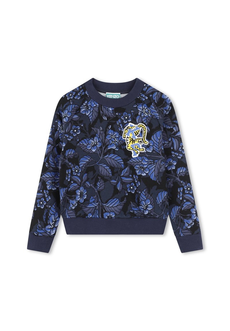 Sweatshirt à motif floral en bleu marine foncé, avec des fleurs bleues et des feuilles vertes. Inclut un logo de tigre brodé en jaune. Poignets et ourlet côtelés.