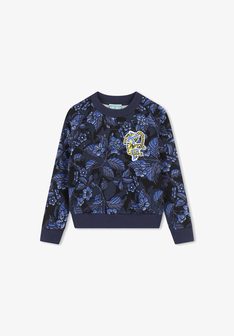 Sweatshirt à motif floral en bleu marine foncé, avec des fleurs bleues et des feuilles vertes. Inclut un logo de tigre brodé en jaune. Poignets et ourlet côtelés.