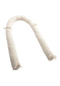 Woven cotton bed bumper in off-white, cylindrical shape, with ties at each end for securing. Textured surface with a grid pattern.