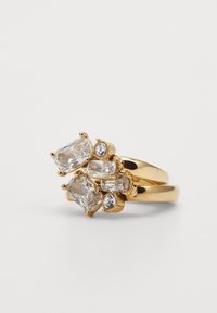 Gold ring featuring multiple clear gemstones in various shapes, including rectangular and round, with a textured setting.