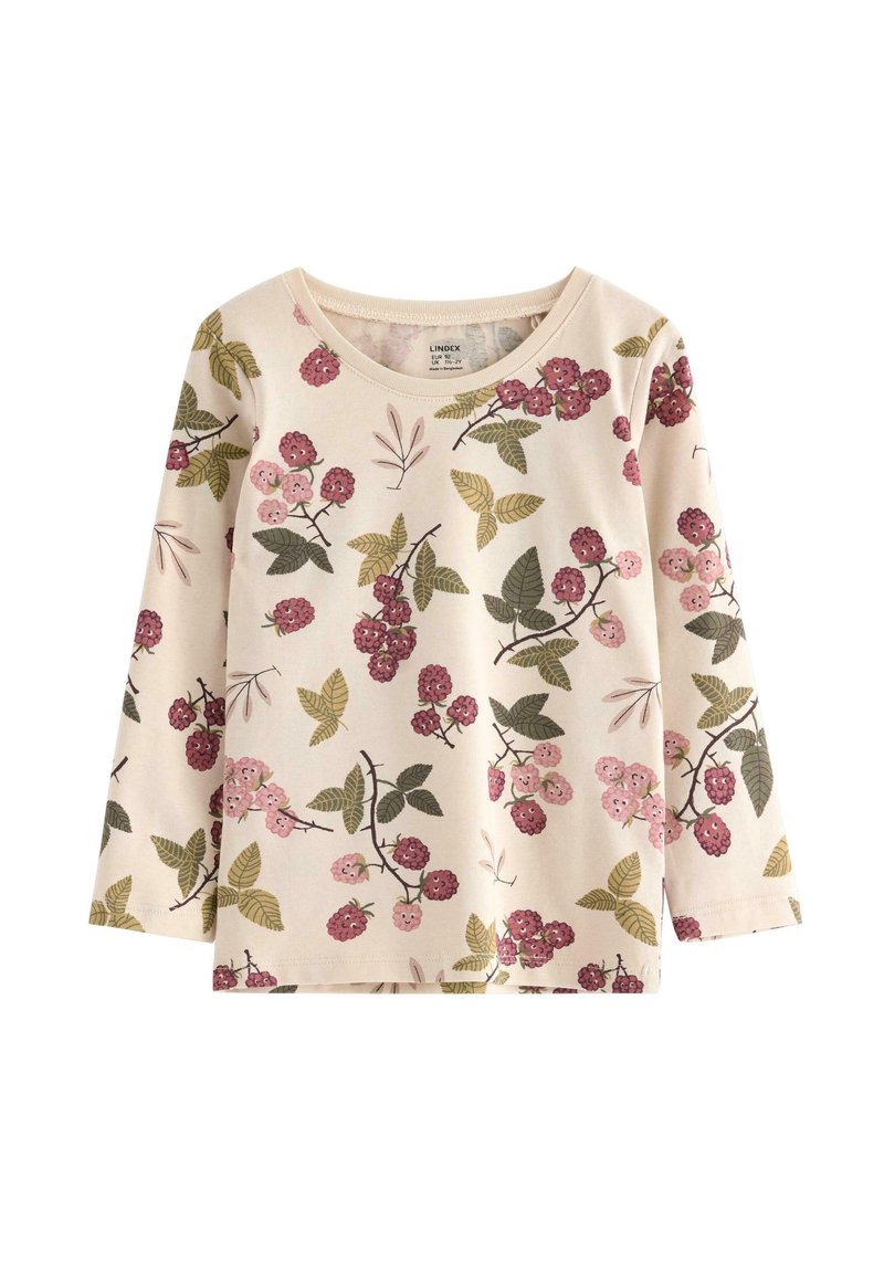 Vaaleanpunainen pitkähihaine paita, jossa on kukkakuosi, jossa näkyy violetteja, vaaleanpunaisia ja vihreitä marjoja ja lehtiä pehmeällä, tekstuurilla varustetulla kankaalla.