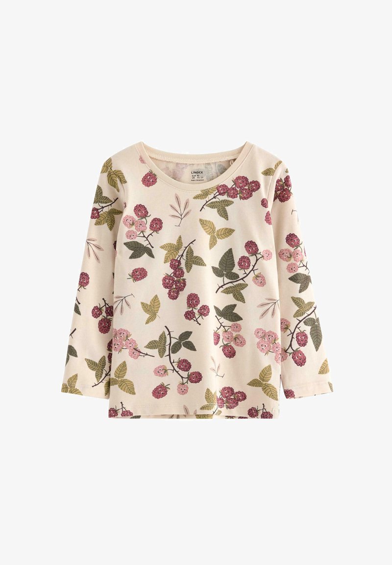 Vaaleanpunainen pitkähihaine paita, jossa on kukkakuosi, jossa näkyy violetteja, vaaleanpunaisia ja vihreitä marjoja ja lehtiä pehmeällä, tekstuurilla varustetulla kankaalla.