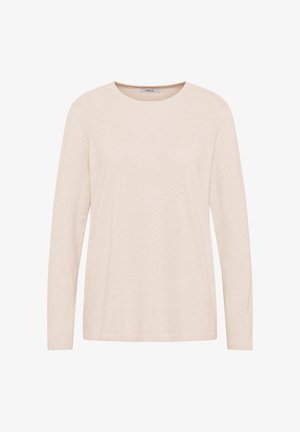 Pitkähihainen beige pyöreäkauluksinen neulepaita, jossa on pieni merkkilappu kauluksessa.