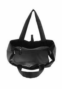 Sac fourre-tout en tissu noir avec une texture matelassée, deux poignées robustes, une poche intérieure zippée et un compartiment spacieux doublé de gris.