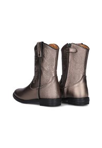 Metallic bronze ankle boots with a textured finish, black rubber sole, side zipper, and pull tab design. Simple and functional style.