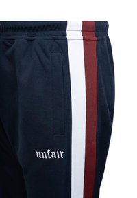 UNFAIR ATHLETICS FRACTURE - Tepláky - navy