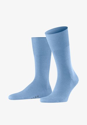 Helleblaue Socken mit gerippten Bündchen und glatter Textur. Verfügt über eine verstärkte Zehen- und Fersenpartie. Logo am Fußbereich aufgedruckt.
