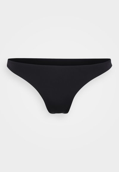 Melnas bikini apakšda; minimālistisks dizains ar mīkstu tekstūru, zemas jostas vietas griezums un bezšuvju malas, lai nodrošinātu gludu piegulšanu.