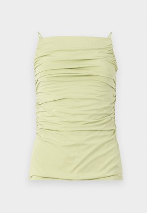 Ruched, light green tank top with thin straps. Made of soft, stretchy fabric. Features a fitted silhouette and textured design throughout.