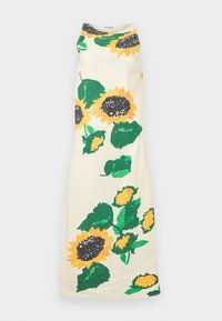 Αμάνικο μακρύ φόρεμα με μεγάλο κίτρινο ηλιοτρόπιο και εκτύπωση πράσινου φύλλου σε κρεμ φόντο, ψηλός λαιμός, ετικέτα Moschino στο εσωτερικό.