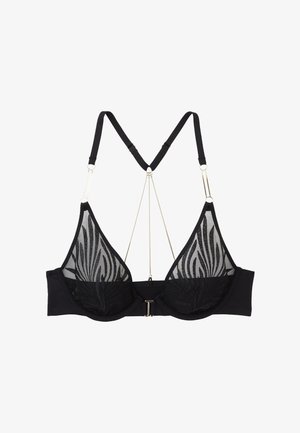 Reggiseno nero trasparente con ferretto, coppe in rete con motivo zebra, spalline regolabili e delicato dettaglio a catena dorata sul retro.