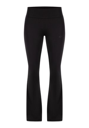 Černé legíny vyrobené z elastického materiálu, s přiléhavým pasem a rozšířenými nohavicemi. Diskrétní logo detail poblíž pasu.