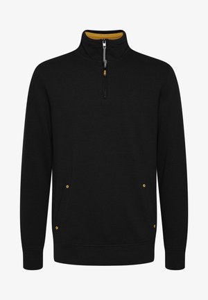 Zwart fleece sweater met een hoge kraag en een kwart rits. Voorzien van twee zijzakken met gele accenten en geribde manchetten. Zachte textuur.