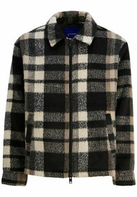 Giacca in pile a quadri con zip frontale, caratterizzata da un motivo a quadri bianco, nero e beige, colletto alla francese e tasche laterali.