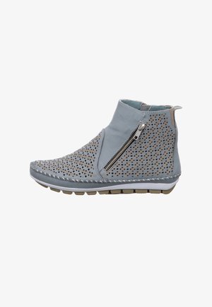 Gray leather ankle boot with perforated design and side zip closure. Features a flexible sole with contrasting beige accents.