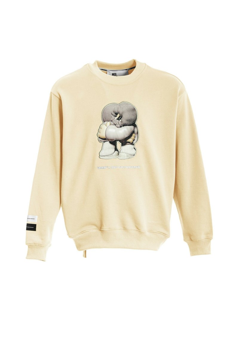 Sudadera beige con cuello redondo, que presenta un gráfico impreso de un personaje en el frente y una etiqueta de logo en la manga.