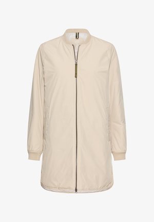 Beige lange jas van gladde stof, met een ritssluiting aan de voorkant, geribde manchetten en twee zijzakken. Eenvoudig, minimalistisch ontwerp.