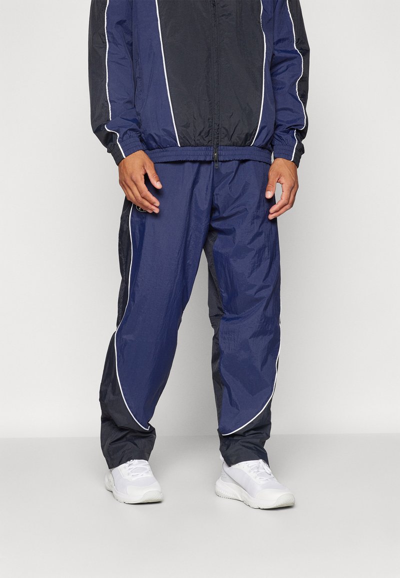 Under Armour - BEST TRACK PANT - Treningo apatinė dalis - black/midnight navy/white, Padidinti