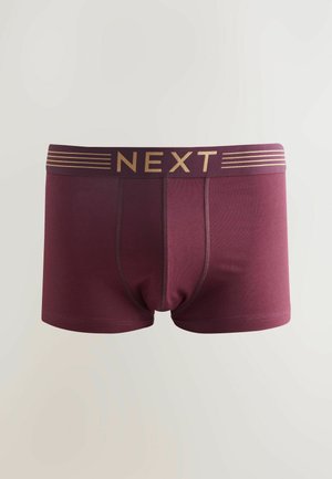 Bordeauxfarbene Boxershorts mit einem goldenen "NEXT"-Logo und horizontalen Streifen am Bund. Glattes Material mit einem körperbetonten Design und ohne Muster.