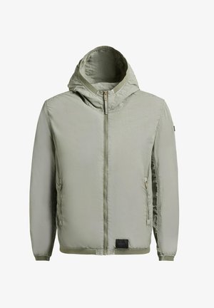 Veste à capuche vert clair avec fermeture éclair à l'avant, poches latérales zippées et poignets élastiques, dotée d'un petit patch noir près de l'ourlet.