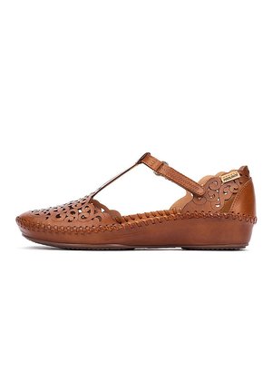 Sandale compensée en cuir marron pour femmes avec bride en T, motifs floraux découpés, bords festonnés et détail de semelle cousue.