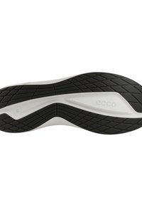 Podeszwa buta ECCO z czarną teksturowaną gumą, z białą wkładką. Krzywoliniowy kształt z rowkami zapewniającymi przyczepność i wsparcie.