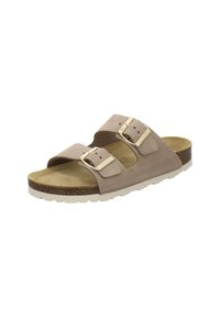 Brown two-strap sandal with metallic buckles, cork footbed, and a light-colored rubber sole. Smooth texture and open design for breathability.