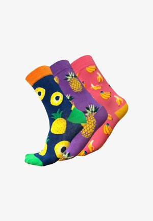 Drie paar katoenen sokken: donkerblauw met gele ananassen, paars met ananassen en roze met gele bananen. Elk paar heeft een patroon.