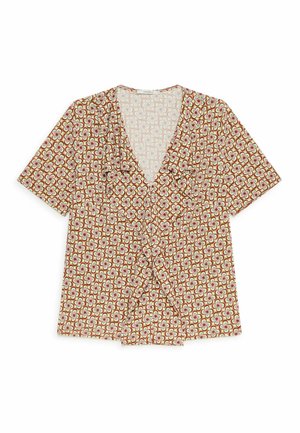Blusa a maniche corte con motivo geometrico retrò in marrone, verde e crema, con scollo a V e leggero dettaglio di volant lungo la scollatura.