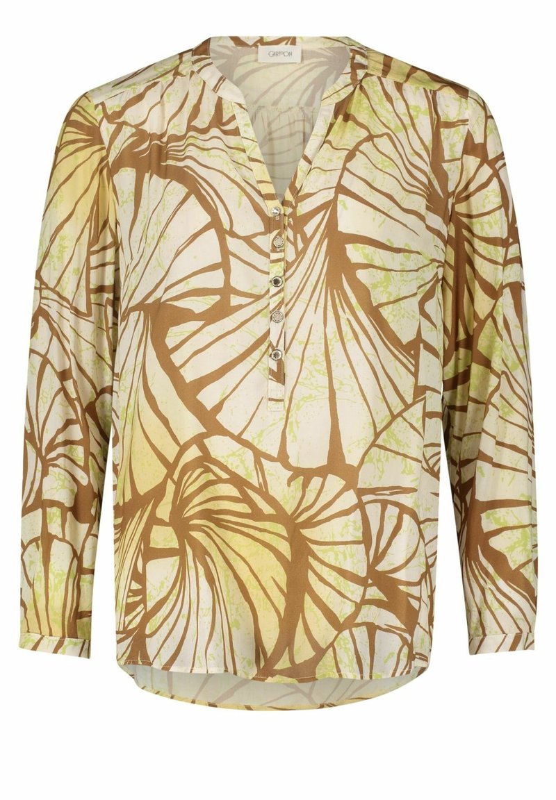 Långärmad blus med botaniskt bladmönster i beige, ljusgrön och brun, med rund halsringning och fem knappar på framsidan.