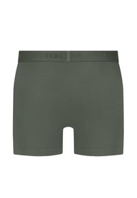 Dark green boxer shorts with a soft, smooth texture, featuring a wide elastic waistband embossed with the brand name.