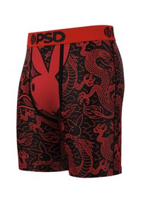 Boxeri roșii și negri, cu un design modelat cu dragoni și iepuri, având un brâu elastic roșu solid, inscripționat "PSD."
