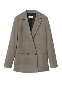 Valkoinen ja musta houndstooth-kuvioinen kaksirivinen bleiseri, jossa on leikatut kaulukset, kaksi etutaskua ja ruskeat napit.