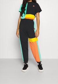 Ellesse Pantalones deportivos - black