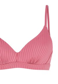 Bra wireless in tessuto a costine rosa, con coppe sagomate e spalline regolabili, su sfondo bianco.