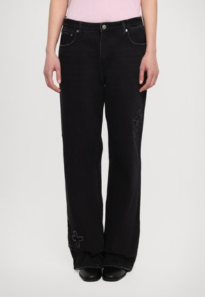 Black wide-leg jeans with a faded finish, featuring decorative stitching on the lower legs and five-pocket design. Made of denim.