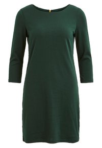 Grön klänning med trekvartslånga ärmar, rund halsringning och en guldram i ryggen. Mjuk, slät tyg, knälång design.