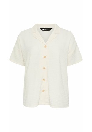 Chemise à manches courtes de couleur crème avec une texture, dotée d'un col de style camp et de cinq boutons beiges sur le devant.