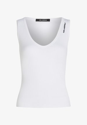 Débardeur sans manches blanc avec une texture côtelée, doté d'un profond décolleté en V et d'un subtil logo "Karl Lagerfeld" sur l'épaule.