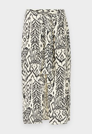 Melna un balta rakstaina svārki ar priekšējo saiti, ar smalkiem ģeometriskiem rakstiem uz viegla auduma. Vidēja garuma griezums, maigi teksturēts.