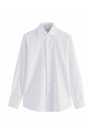 Valge pikkade varrukatega puuvillane särk, millel on klassikaline krae, nööbiga eesmine sulgemine ja sile tekstuur. Omab sirget allääret.